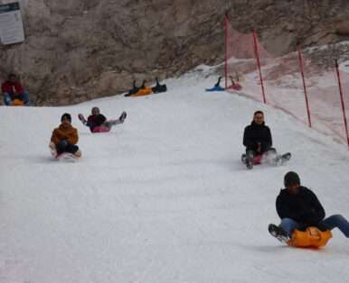 Sledging down the hill at Zugspitze